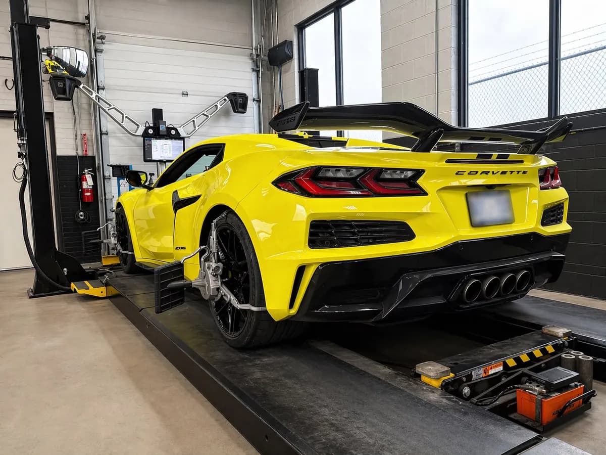 Car on professional wheel alignment rack